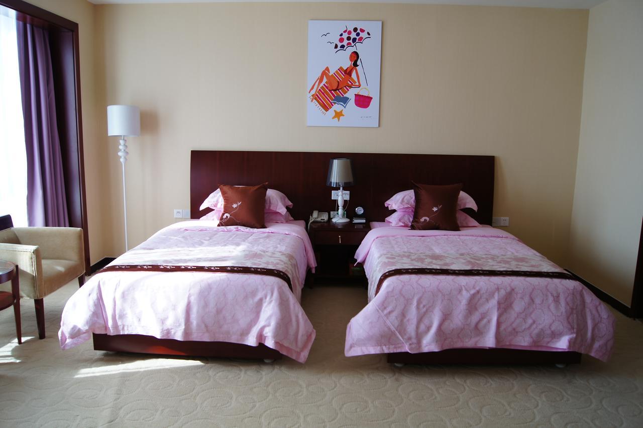 Fuxing Oriental Boutique Hotel Chifeng Quarto foto