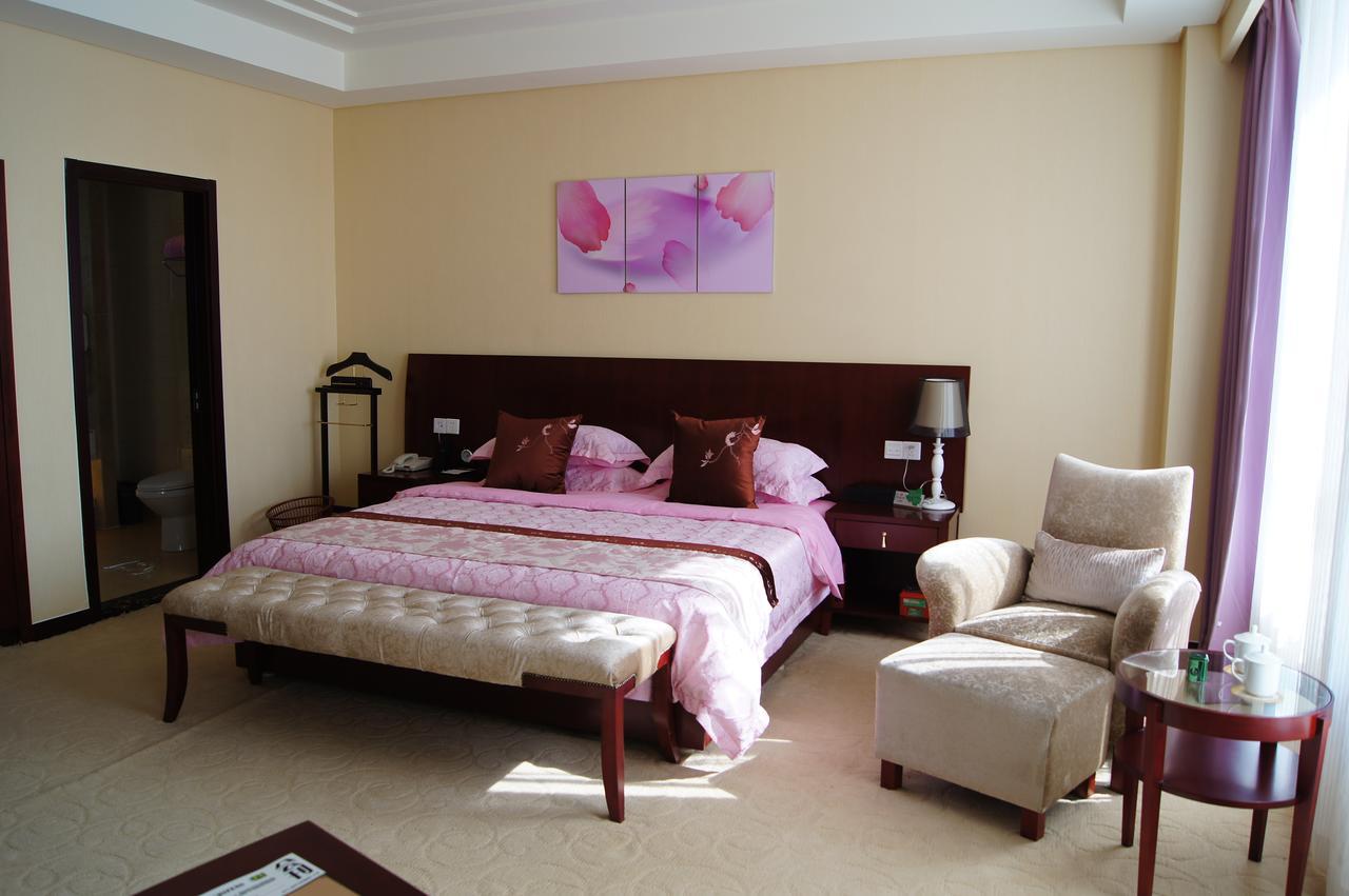 Fuxing Oriental Boutique Hotel Chifeng Quarto foto