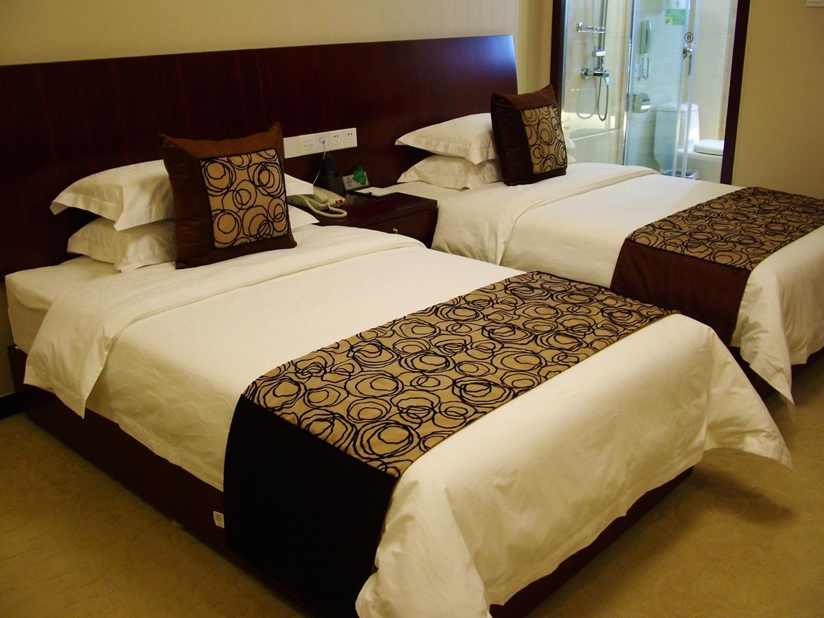 Fuxing Oriental Boutique Hotel Chifeng Quarto foto