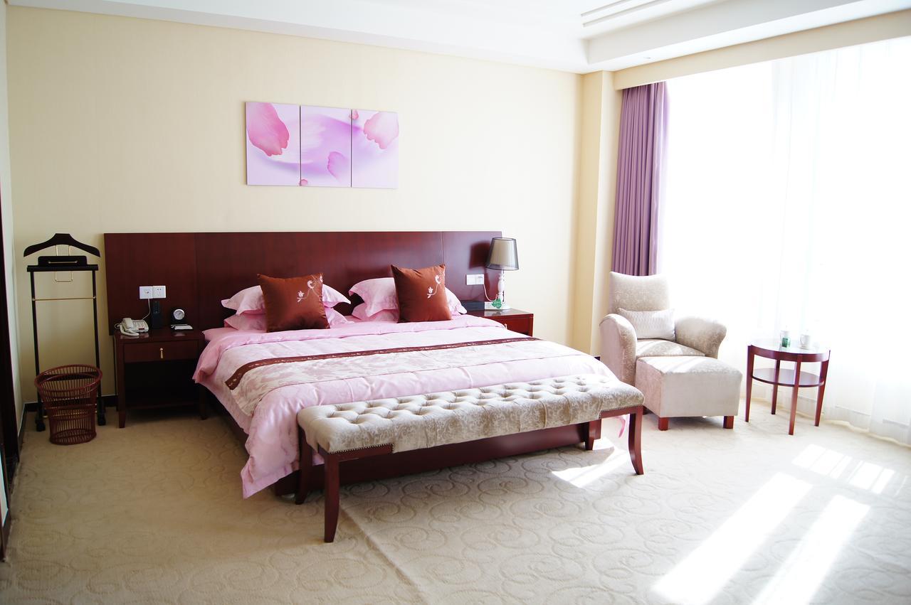 Fuxing Oriental Boutique Hotel Chifeng Quarto foto