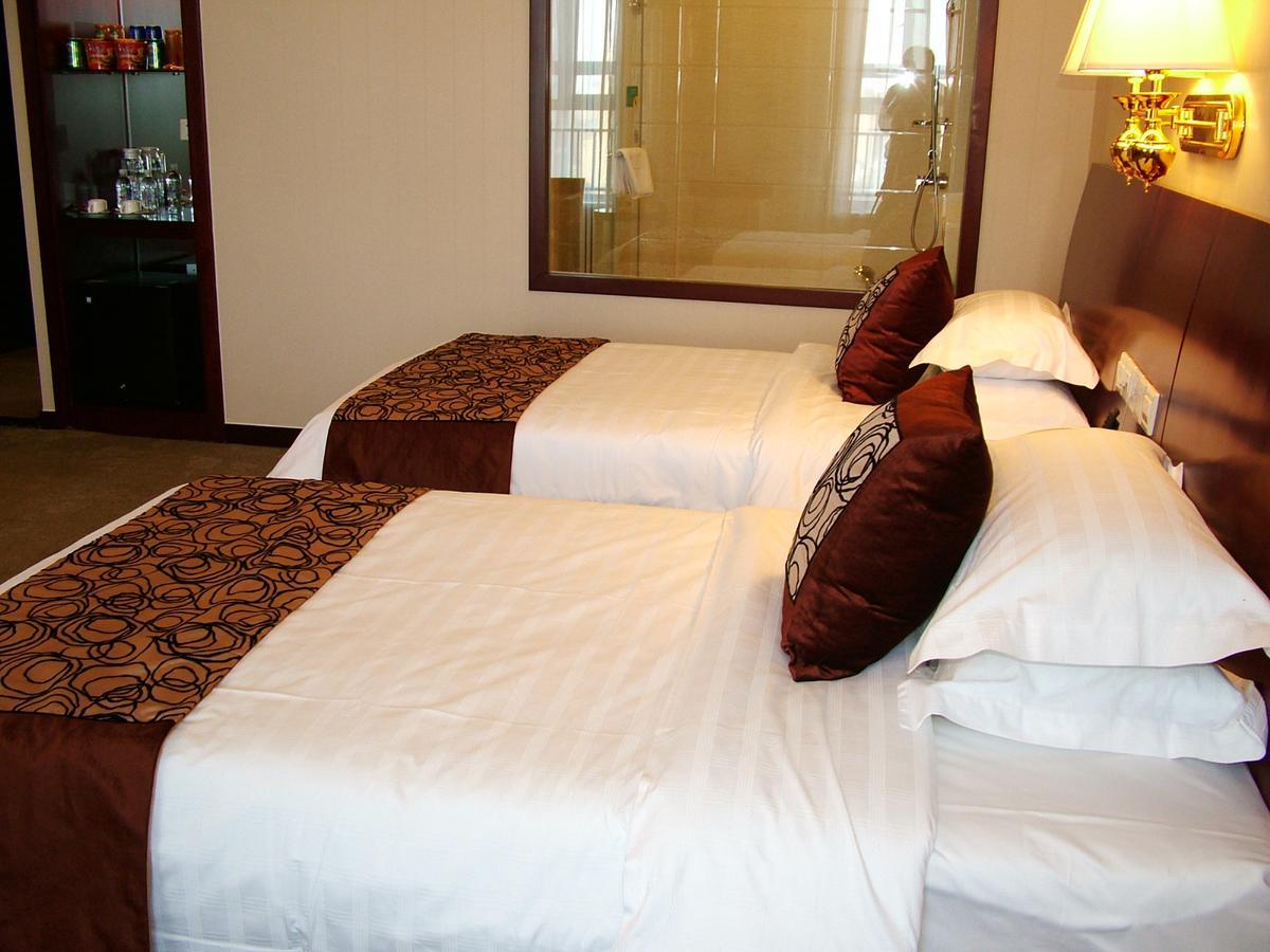 Fuxing Oriental Boutique Hotel Chifeng Quarto foto