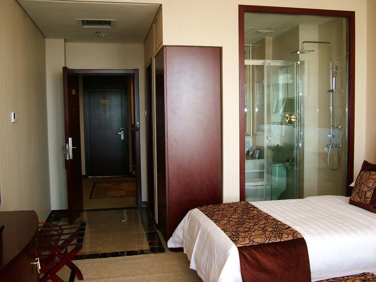 Fuxing Oriental Boutique Hotel Chifeng Quarto foto