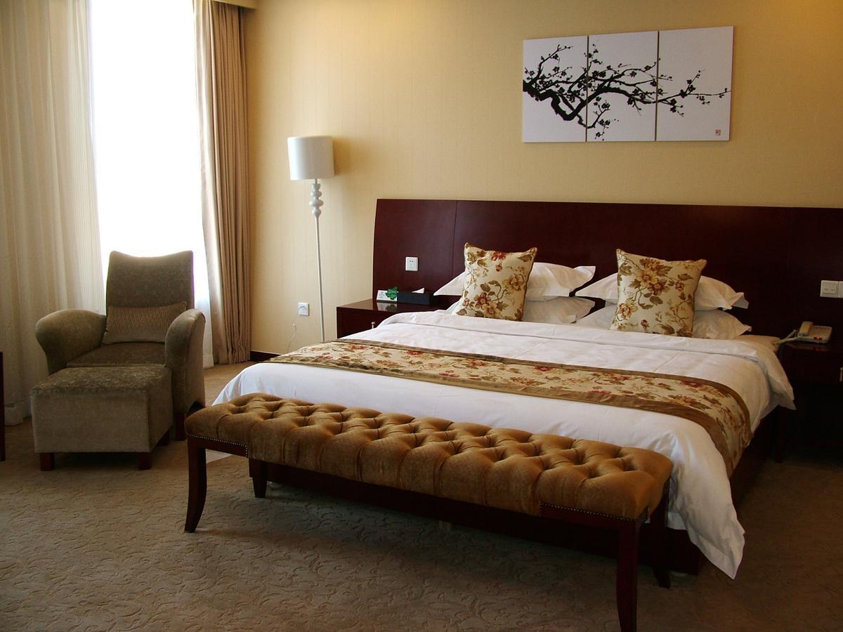 Fuxing Oriental Boutique Hotel Chifeng Quarto foto