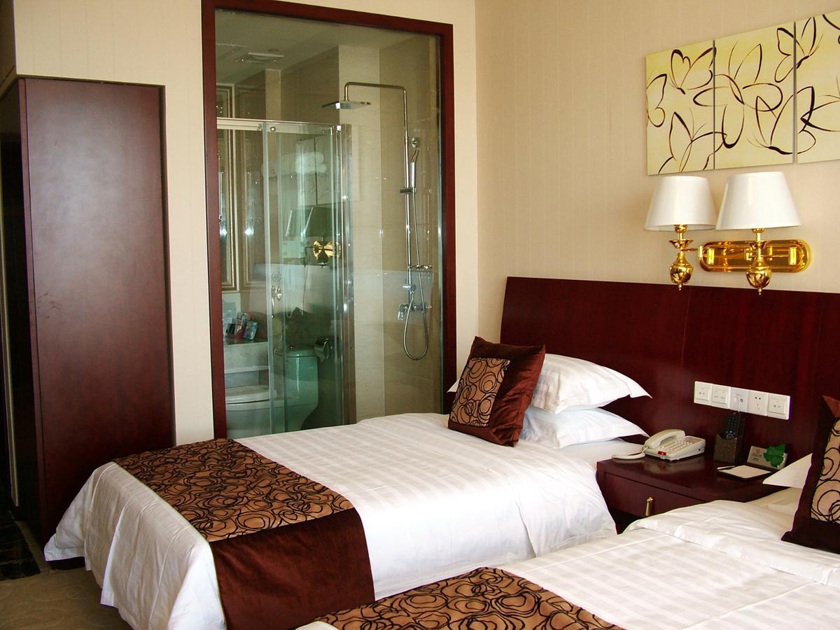 Fuxing Oriental Boutique Hotel Chifeng Quarto foto