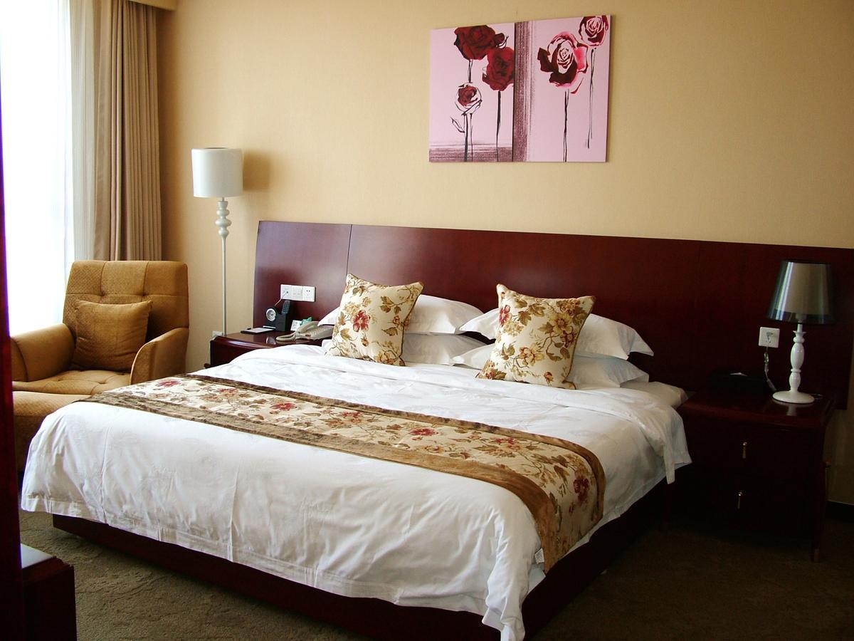 Fuxing Oriental Boutique Hotel Chifeng Quarto foto
