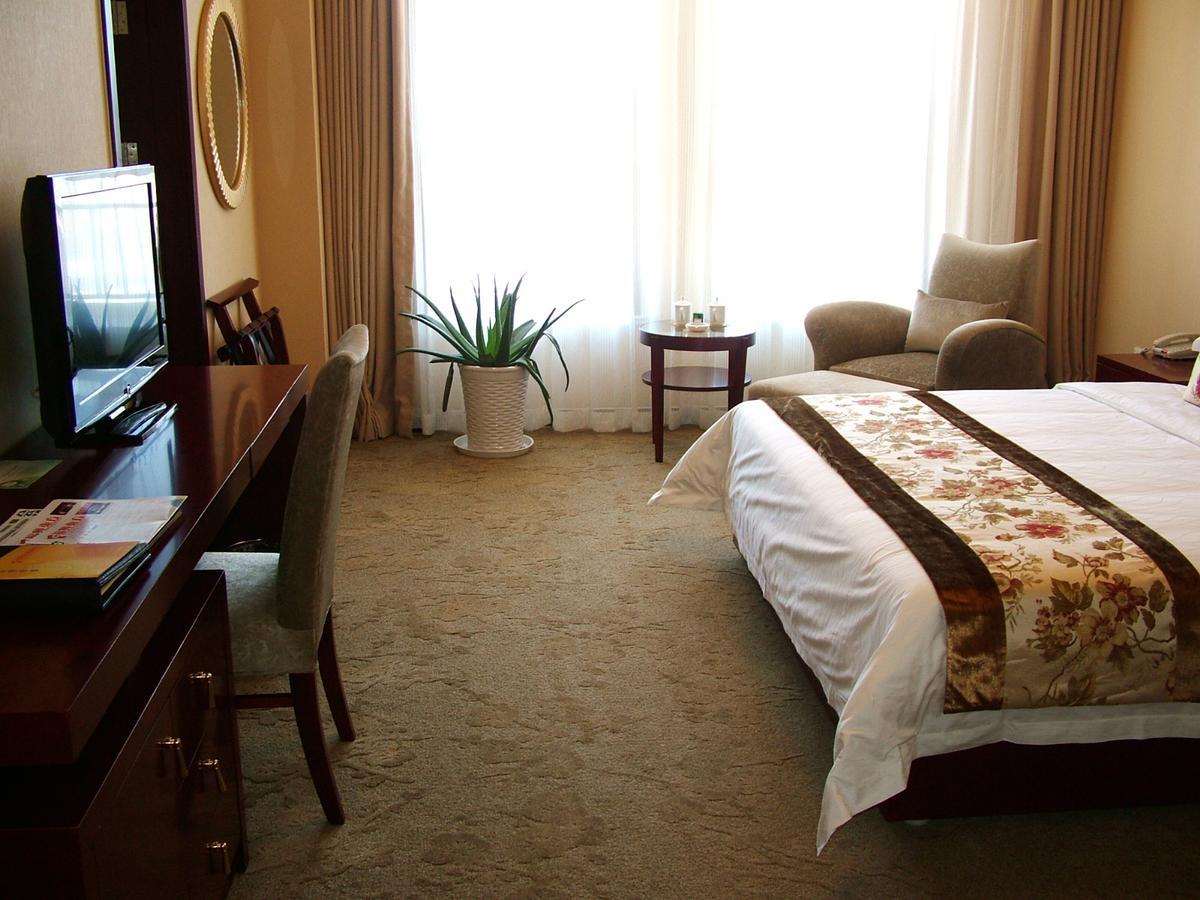 Fuxing Oriental Boutique Hotel Chifeng Quarto foto