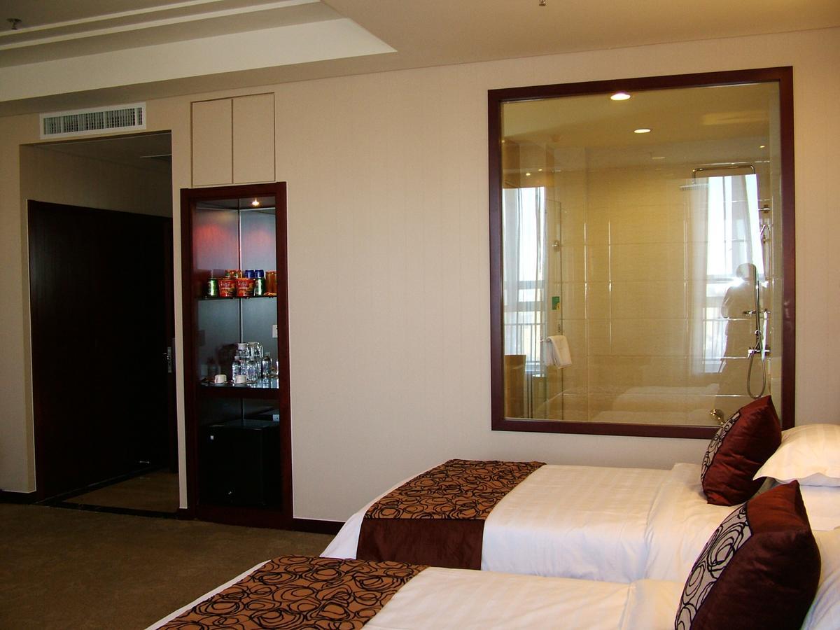 Fuxing Oriental Boutique Hotel Chifeng Quarto foto