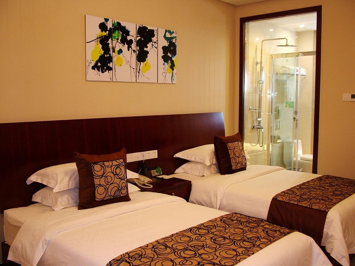 Fuxing Oriental Boutique Hotel Chifeng Quarto foto